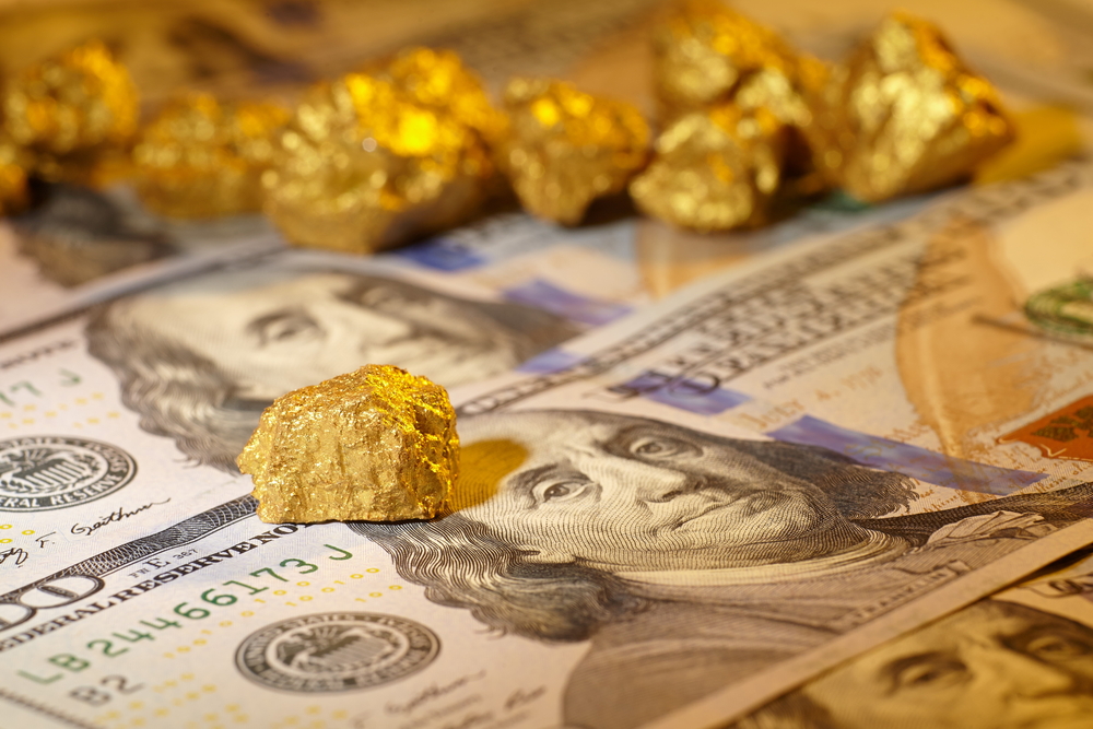 Forex: Ilustrační obrázek Dolar podložený zlatem